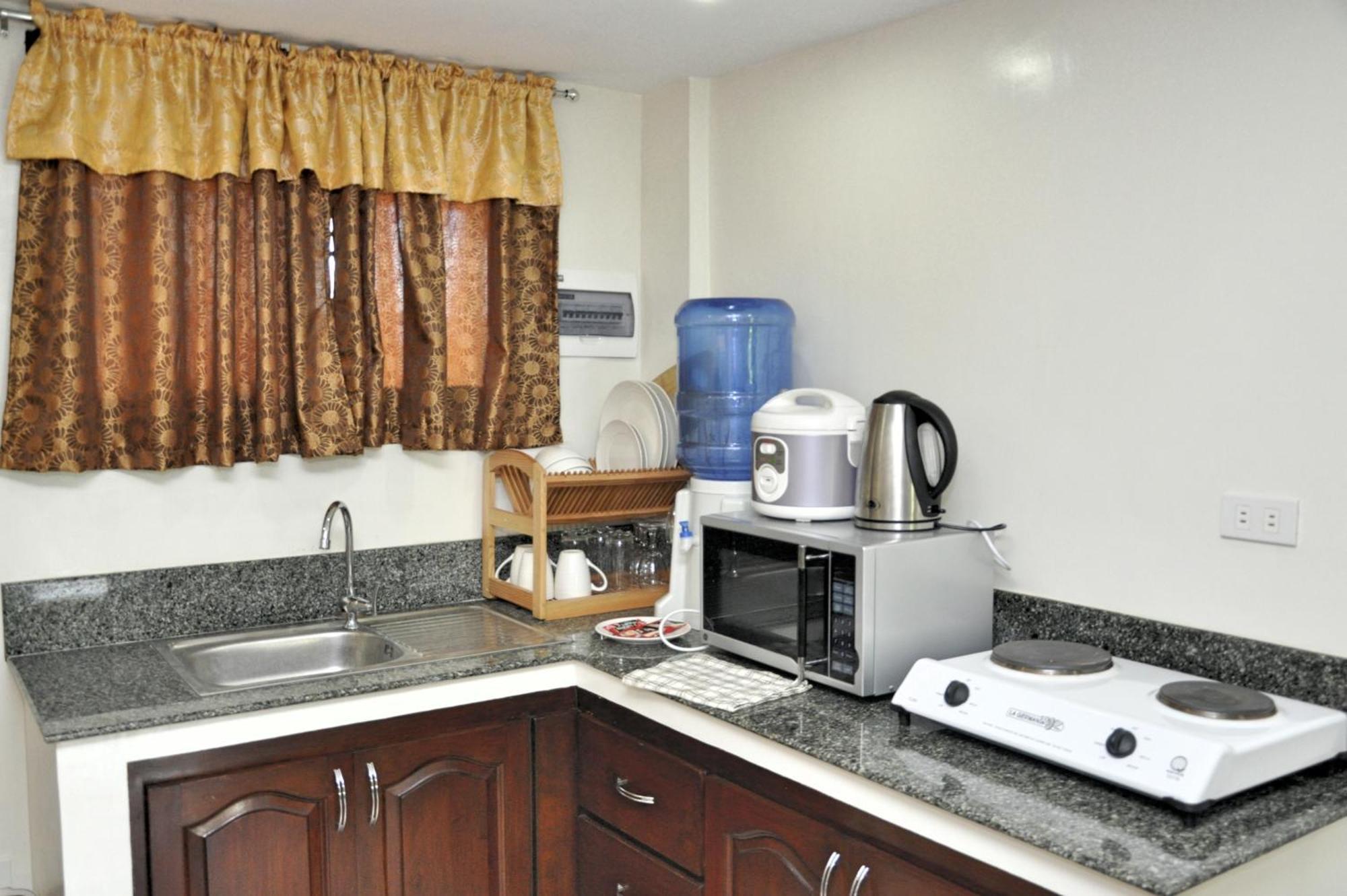 Pal-Watson Apartments Île de Mactan Chambre photo